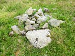Whitelow Cairn (cist grave at the centre).