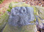 Close up of the Currer Woods Rock Carving, near Eastburn.